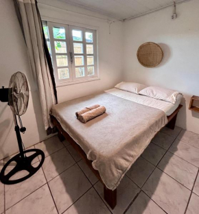 Quarto aconchegante na praia